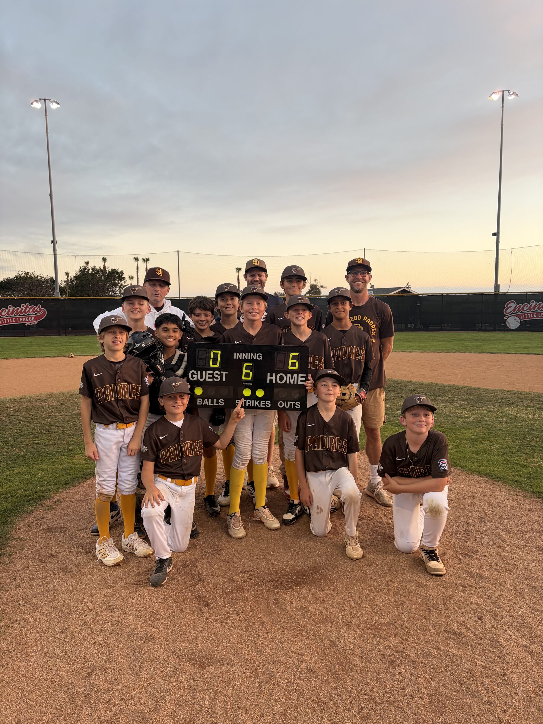 ELL Padres players celebrating their championship win